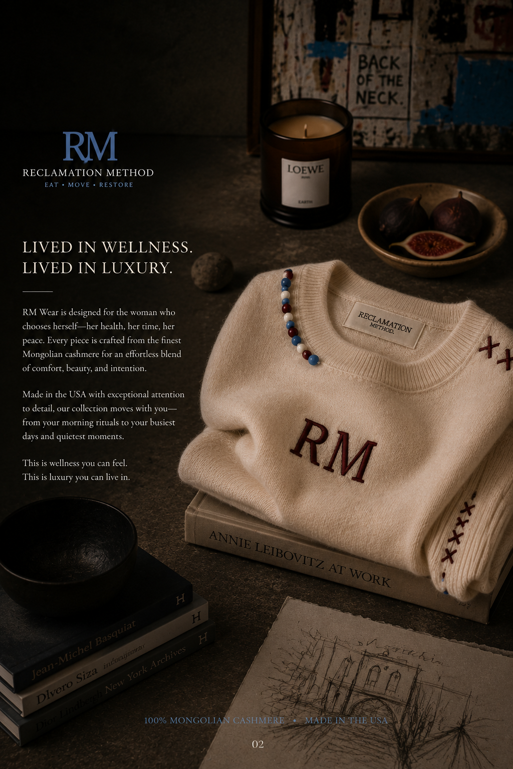 Folded bone cashmere RM crewneck sweater styled with candle, figs and art books