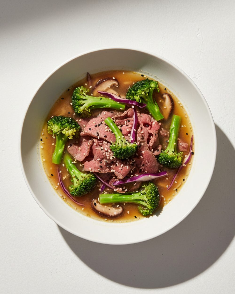 Grass-Fed Beef + Broccoli Ginger Bowl plated for the RM Menopause Support collection