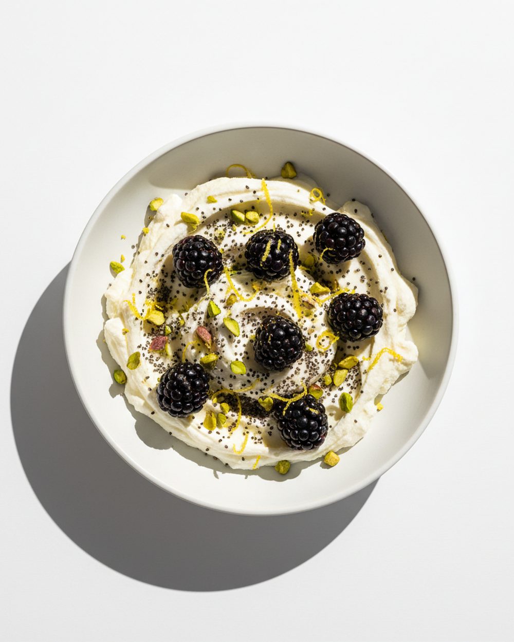 Ricotta + Blackberry Collagen Berry Cups plated for the RM Menopause Support collection