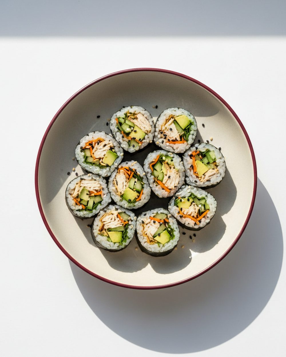 Chicken + Avocado Nori Sushi Rolls plated for the RM Menopause Support collection