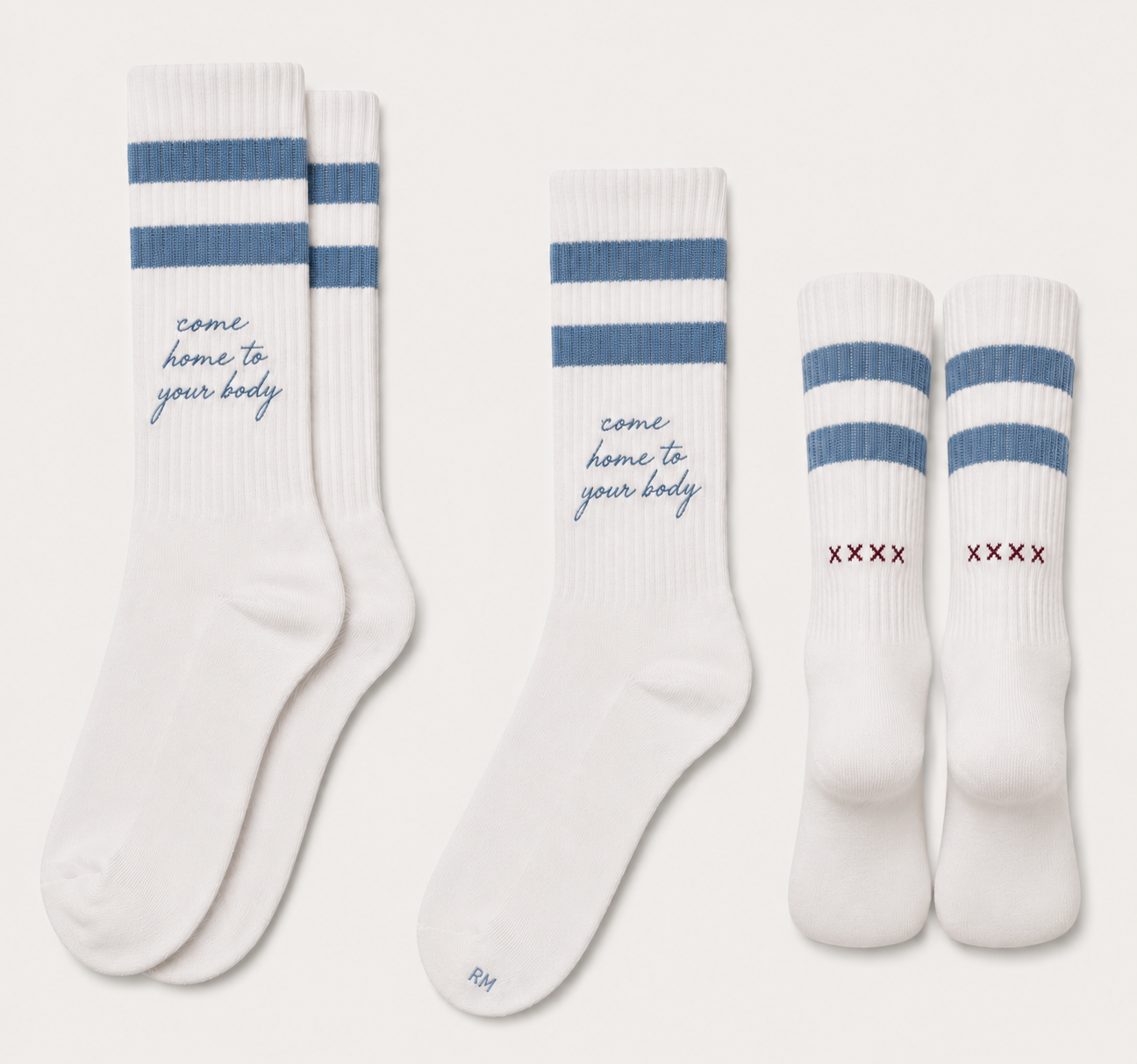 Ivory ribbed crew socks with blue stripes and script embroidery
