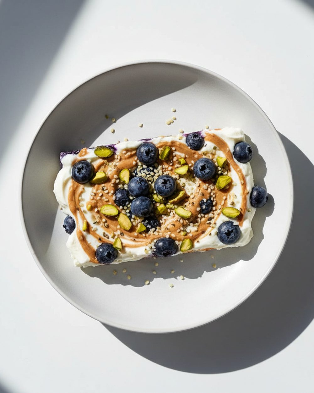 Blueberry Almond Protein Bark plated for the RM Menopause Support collection