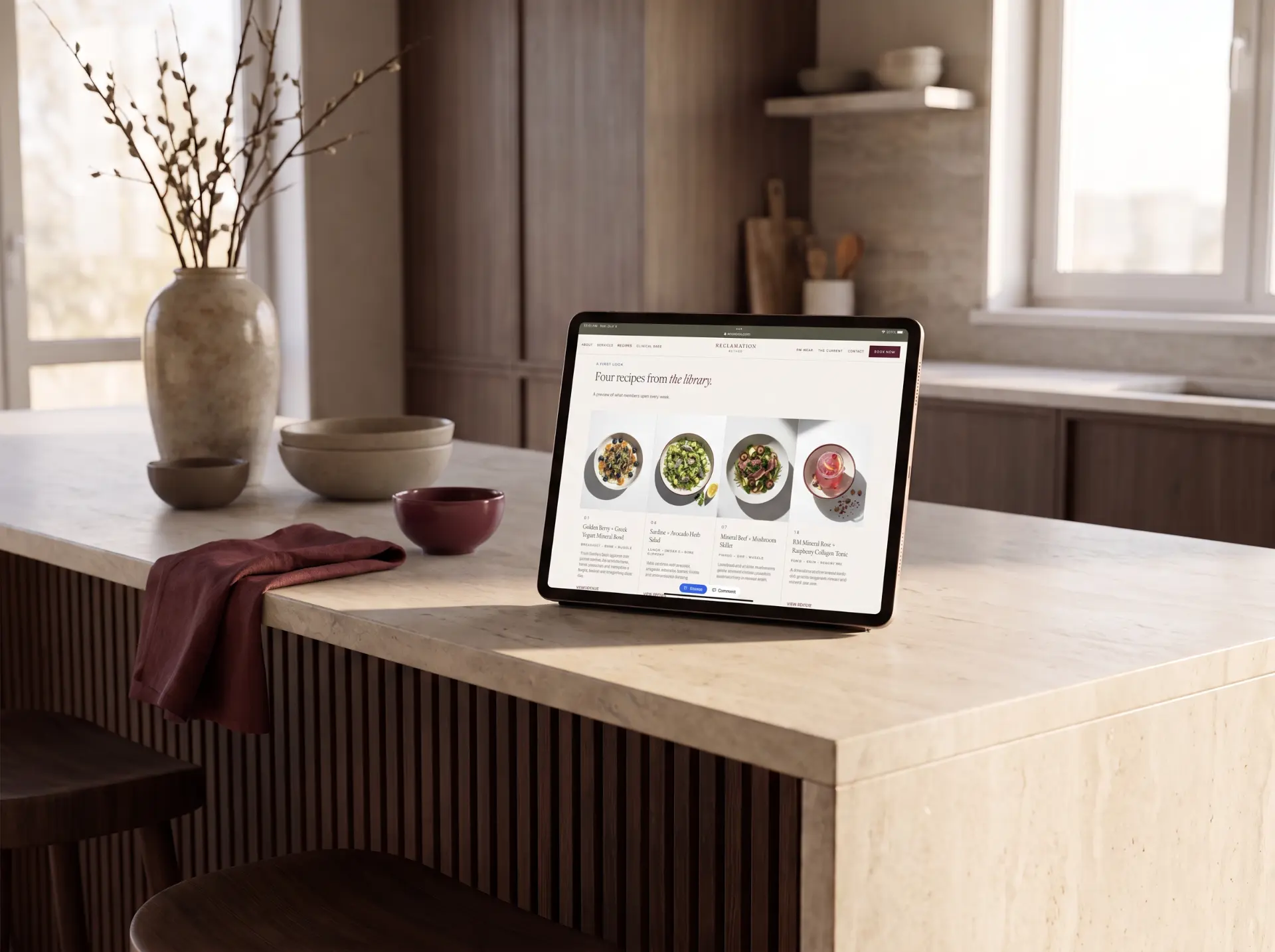 Tablet on a stone kitchen island showing the Reclamation Method recipe library